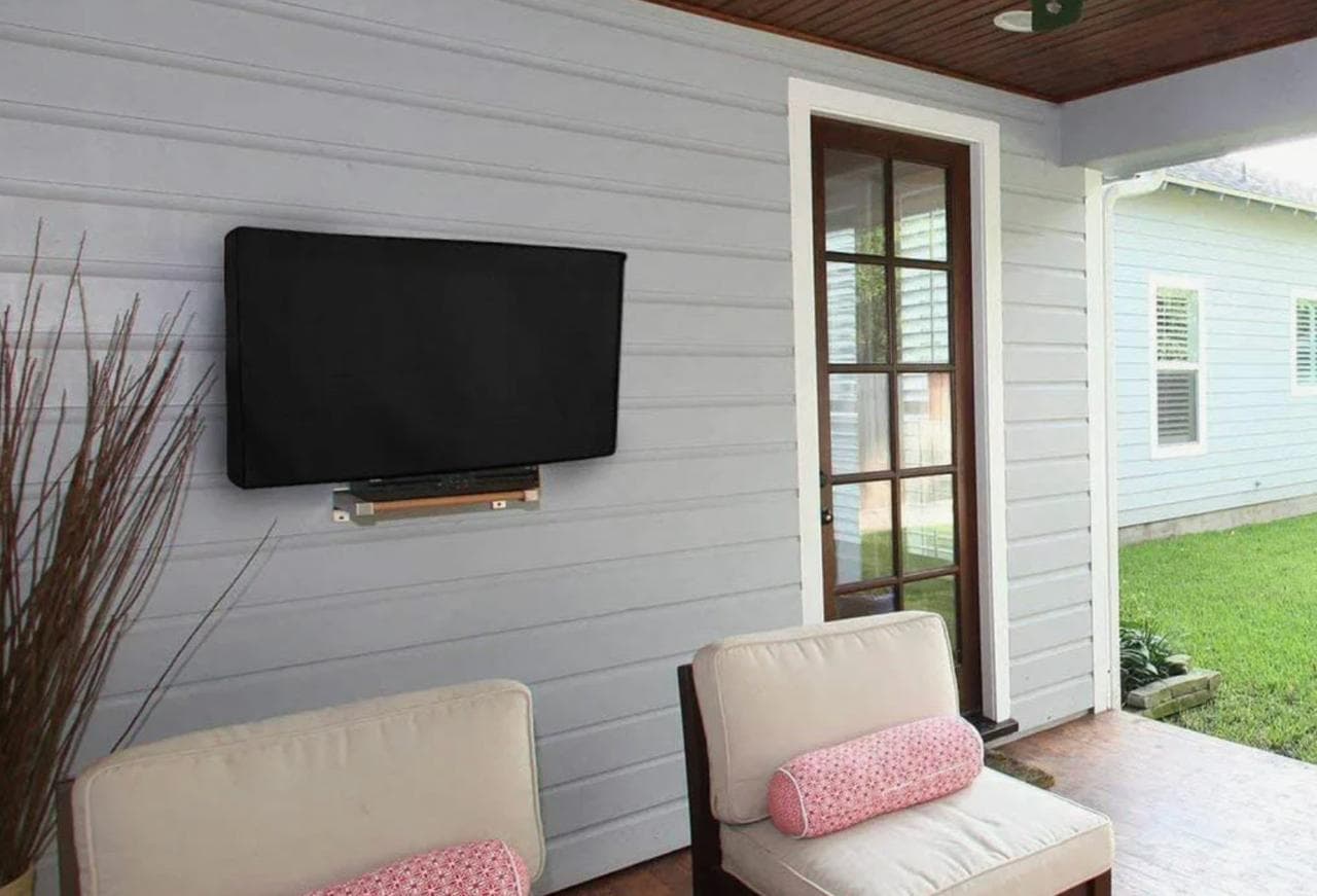 Outdoor TV mounting on covered patio Charlotte NC — weather-resistant tilting bracket