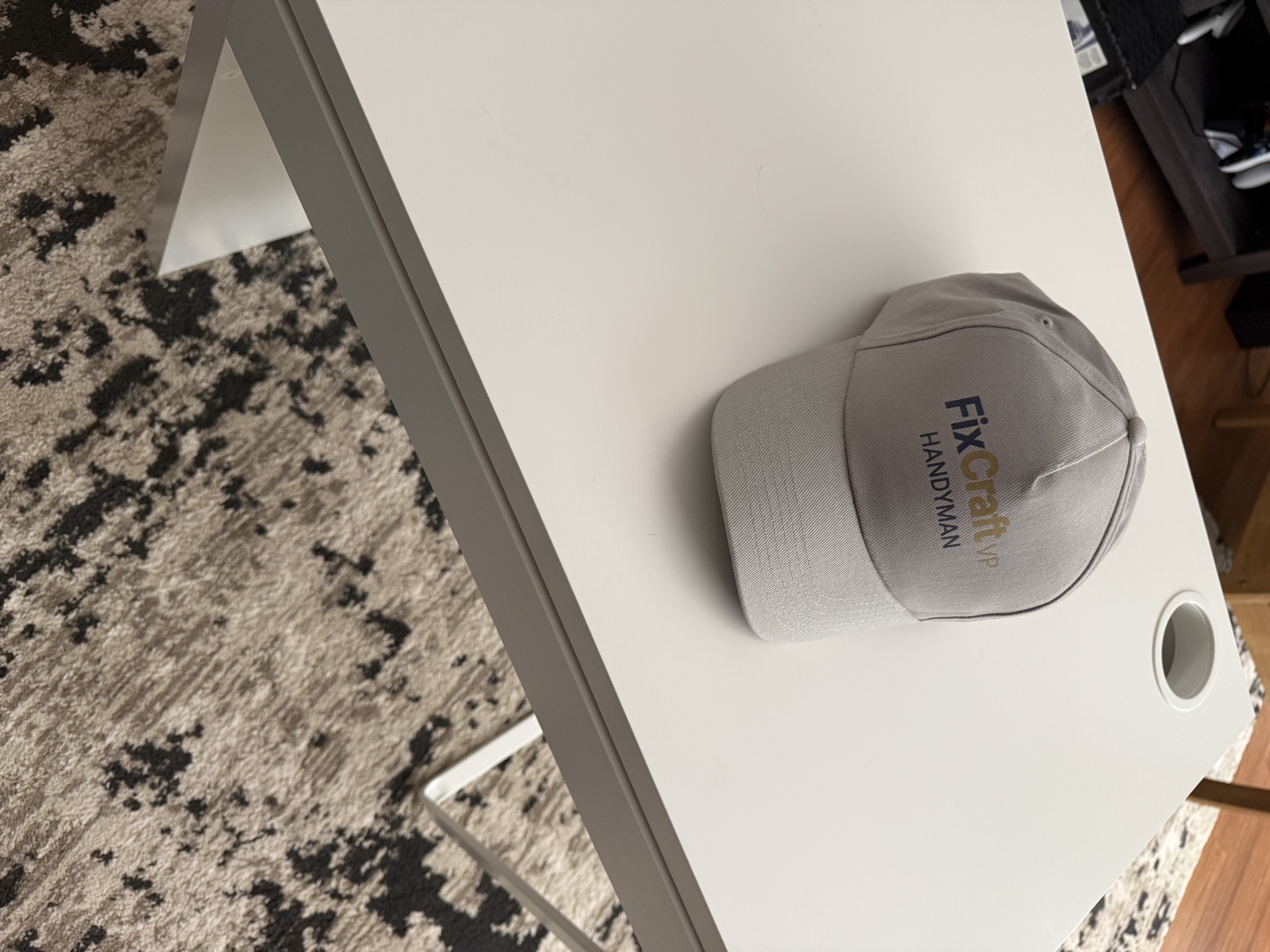 FixCraft VP Handyman branded cap on a job site in Charlotte