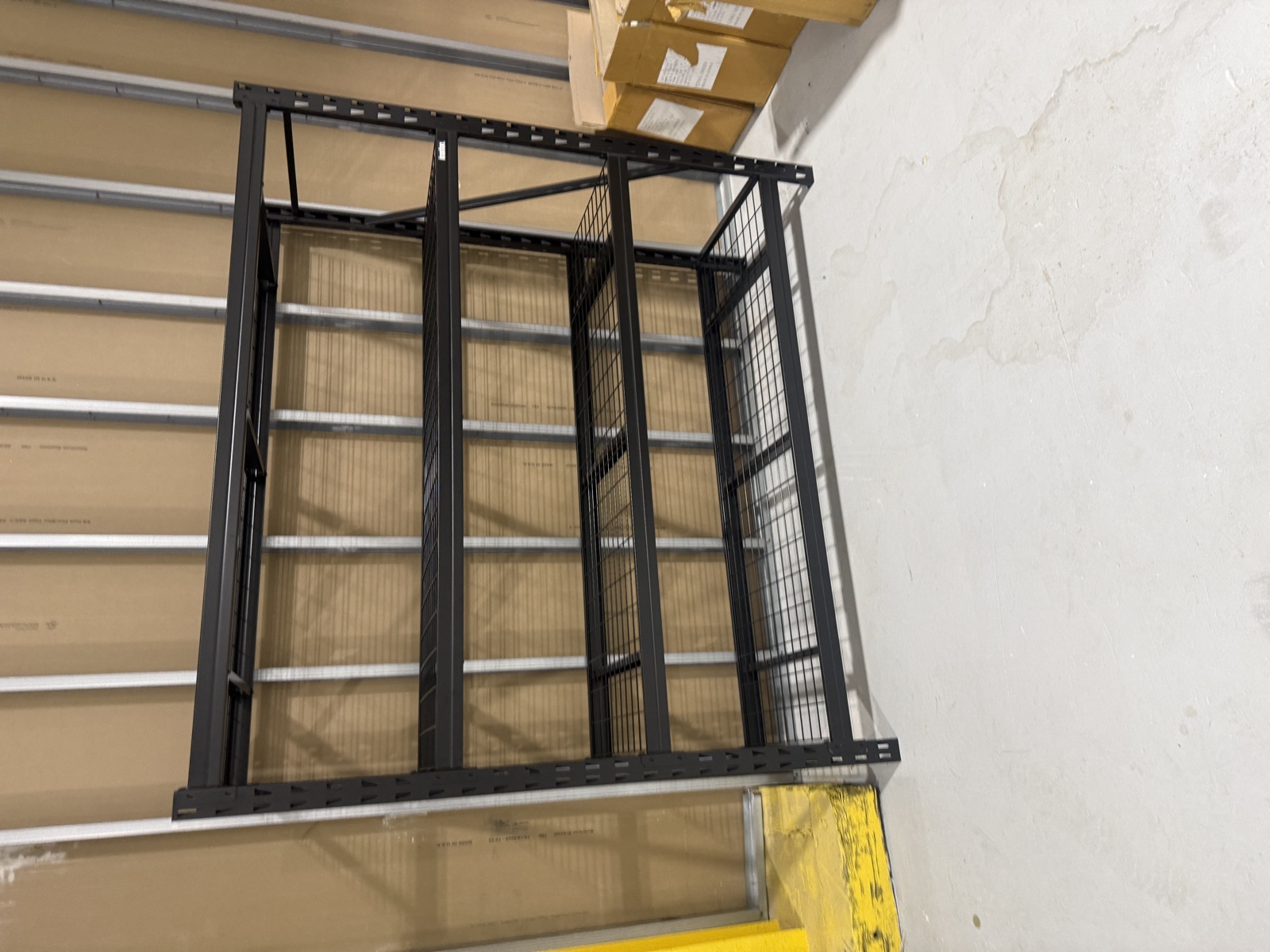 Ironton 4-tier industrial shelving rack assembled in a Charlotte garage