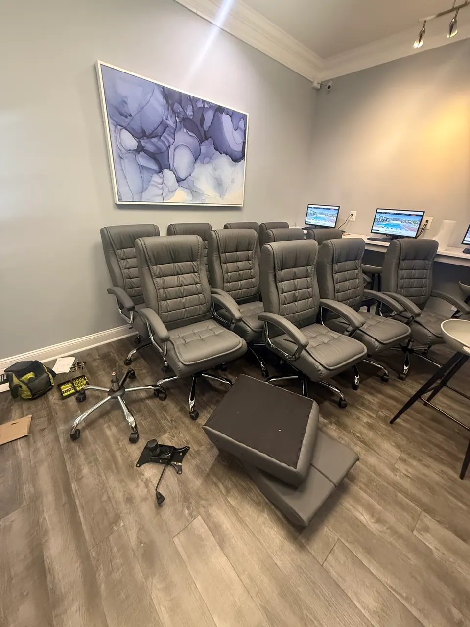 Twelve office chairs assembled by FixCraft VP in a SouthPark Charlotte office