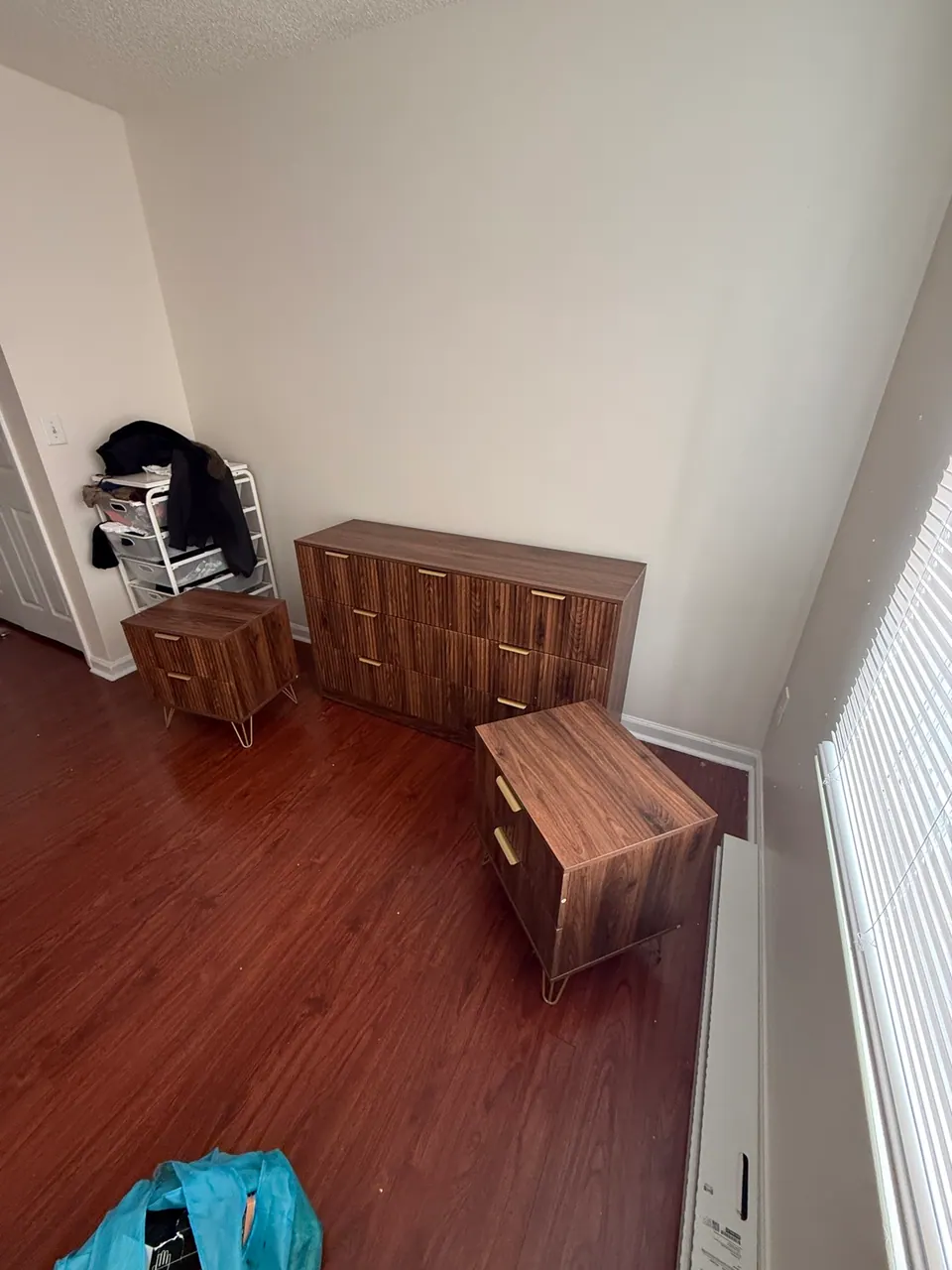 Walnut dresser assembled in Myers Park bedroom by FixCraft VP