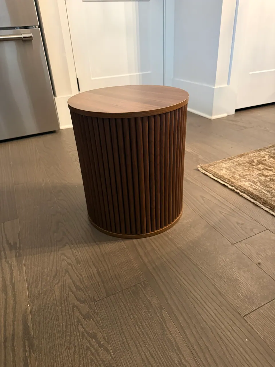 Round walnut reeded side table assembled in Charlotte SouthPark