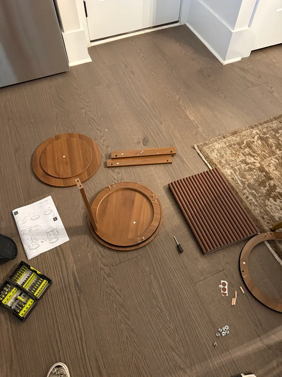 Walnut side table parts laid out before assembly