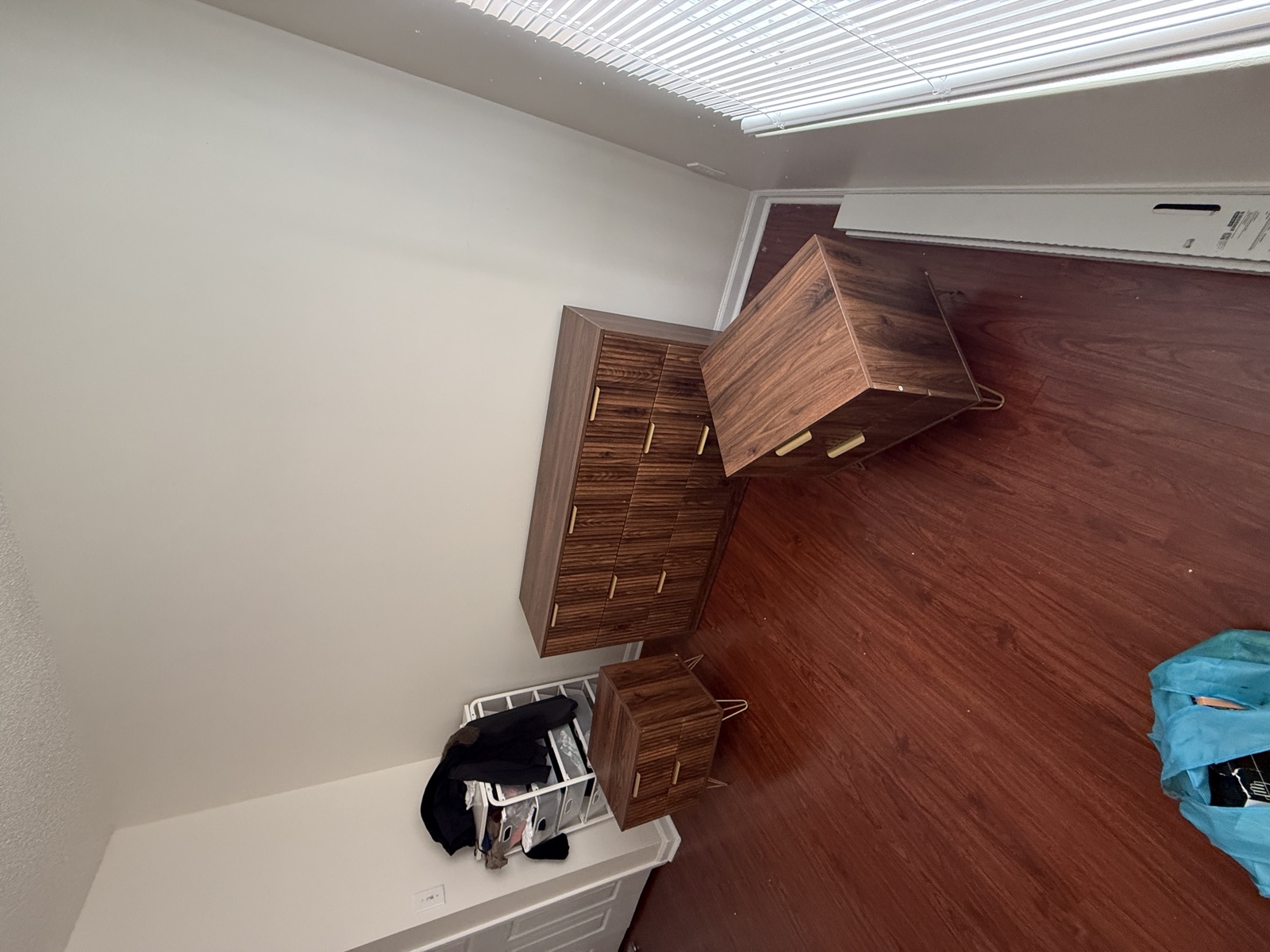 Walnut dresser assembled in Myers Park bedroom by FixCraft VP