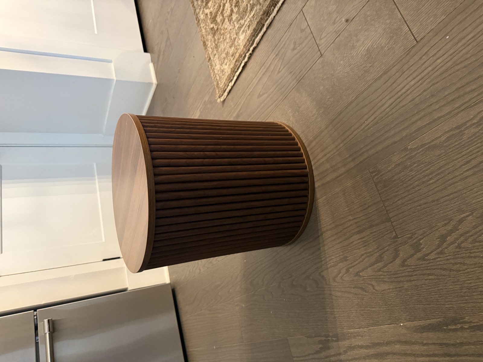 Round walnut reeded side table assembled in Charlotte SouthPark