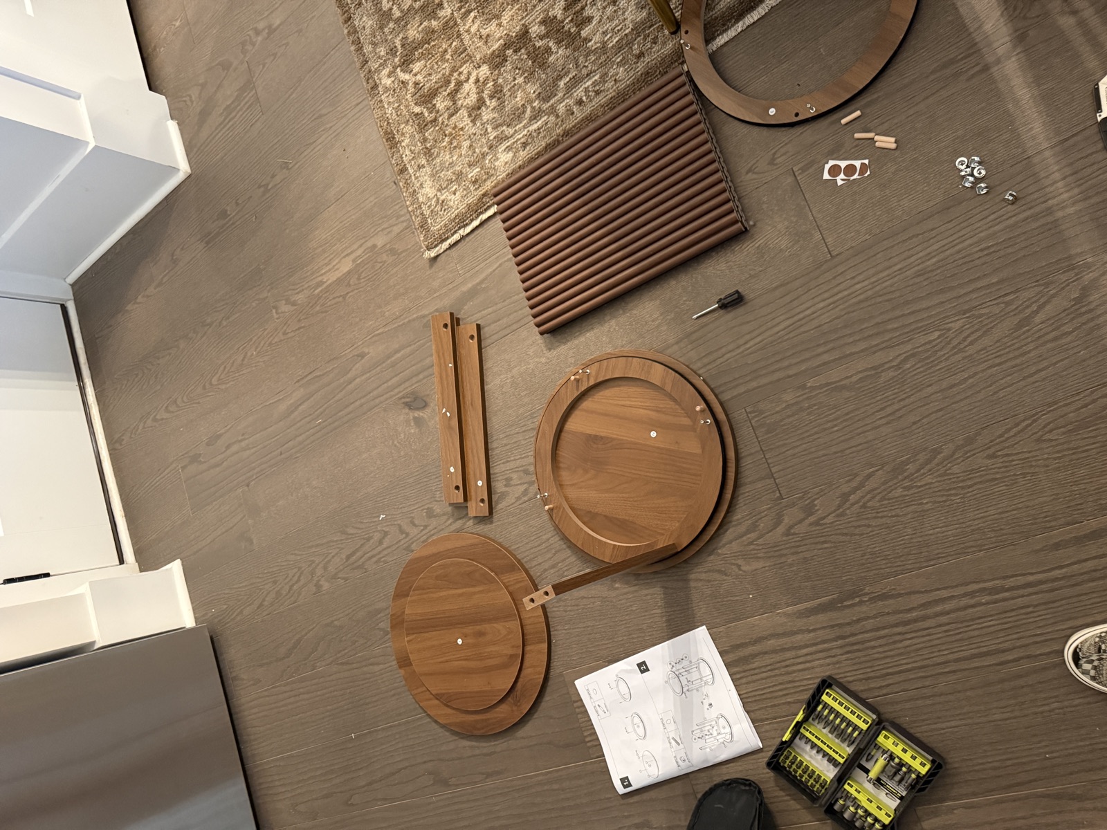 Walnut side table parts laid out before assembly